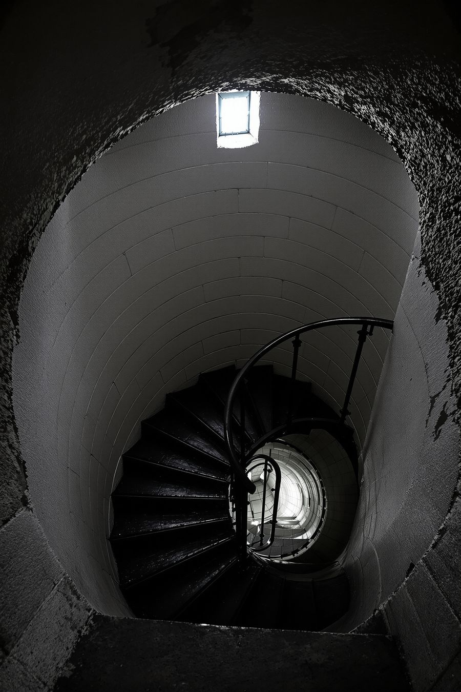 The cast iron spiral stair inside the tower.